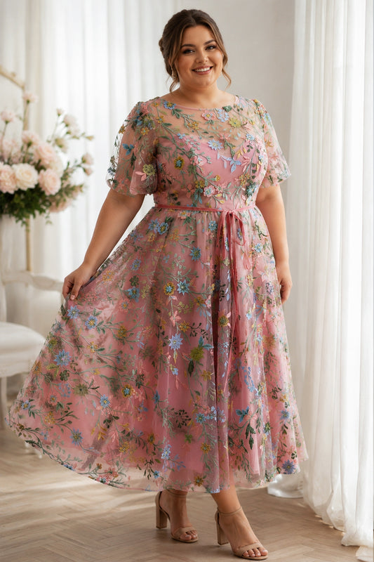 Vestido midi con bordado floral y mangas cortas con corsé