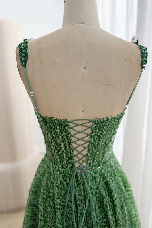 Open lace-up back and adjustable straps on green sequin floral gown