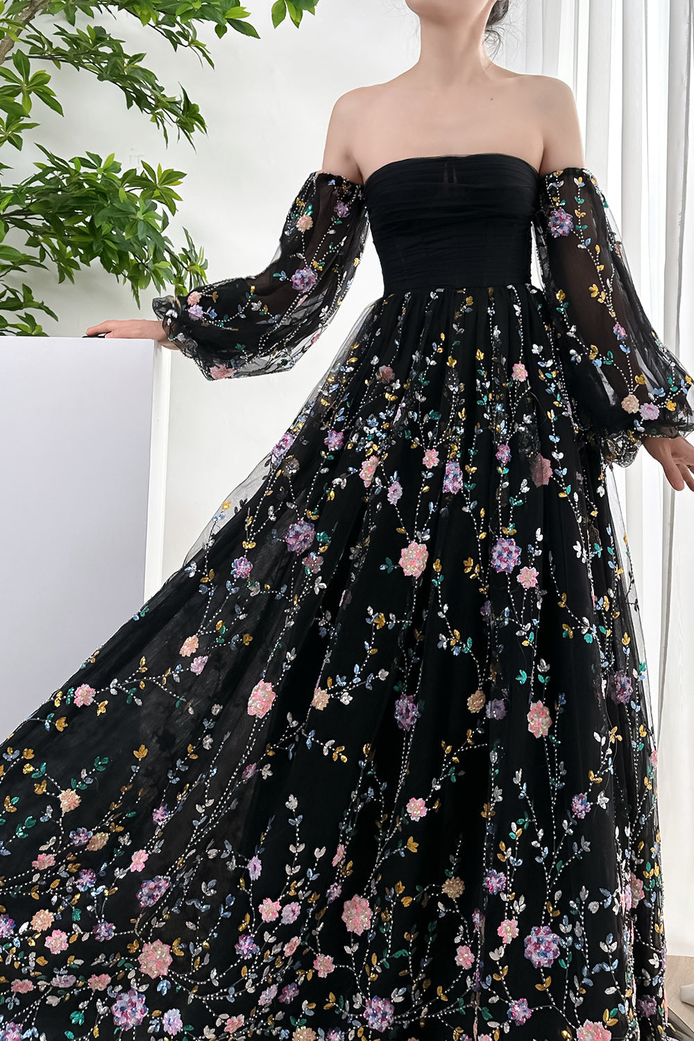 black sequin embroidered dress Black sequin and bugle bead embroidered dress with sheer sleeves