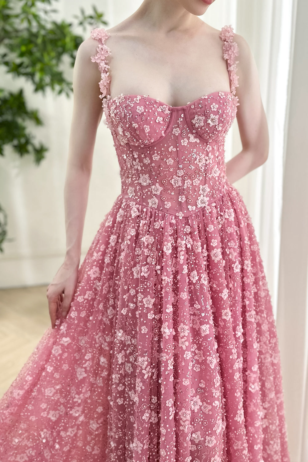 Elegant dusty pink sequin gown with sweetheart neckline, structured bodice, floral appliqué straps, ideal for bridesmaid wedding