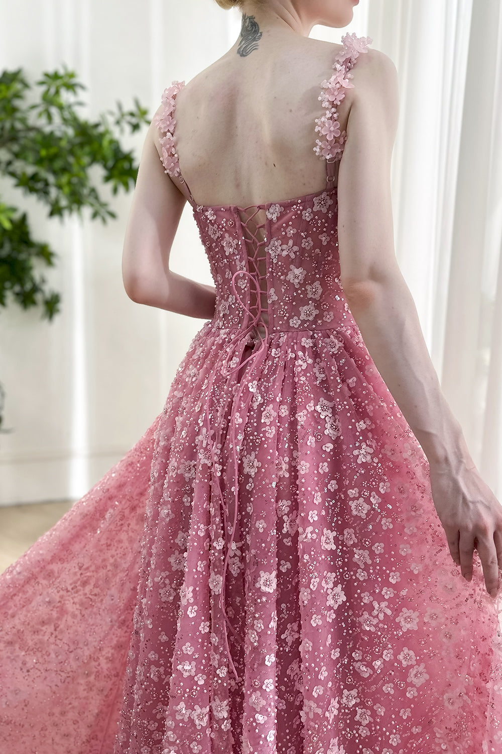 Chic blush pink floral strapped gown floor-length with sequins, romantic bodice construction, ideal for red carpet fashion showcase