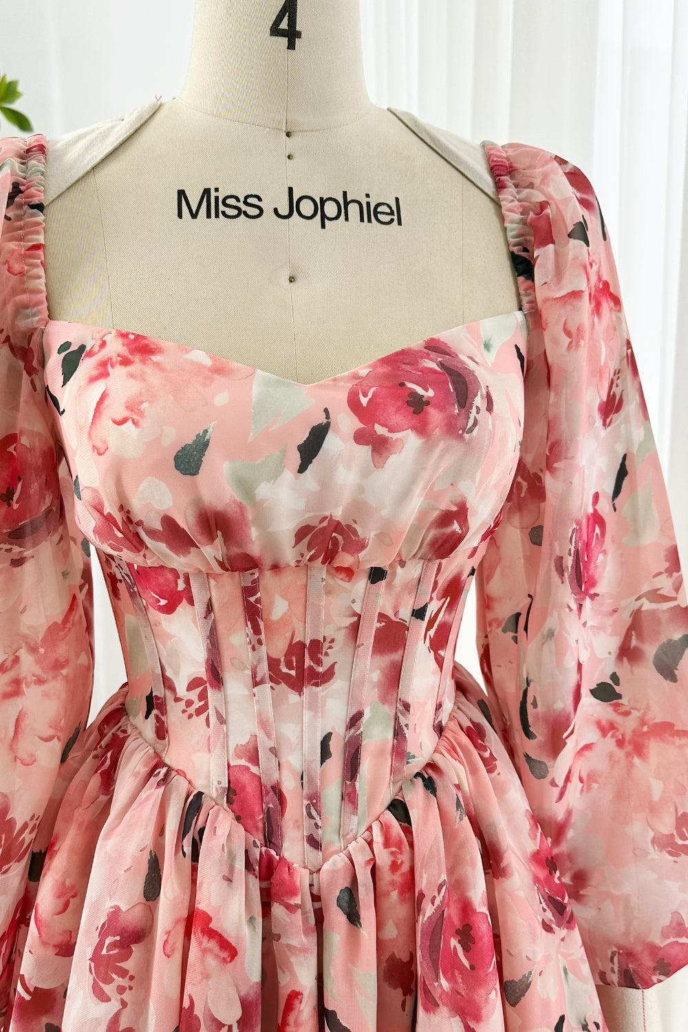 Elegant pink rose chiffon dress with sweetheart neckline, corset waist and tiered ruffle skirt perfect for wedding guest outfits and garden events