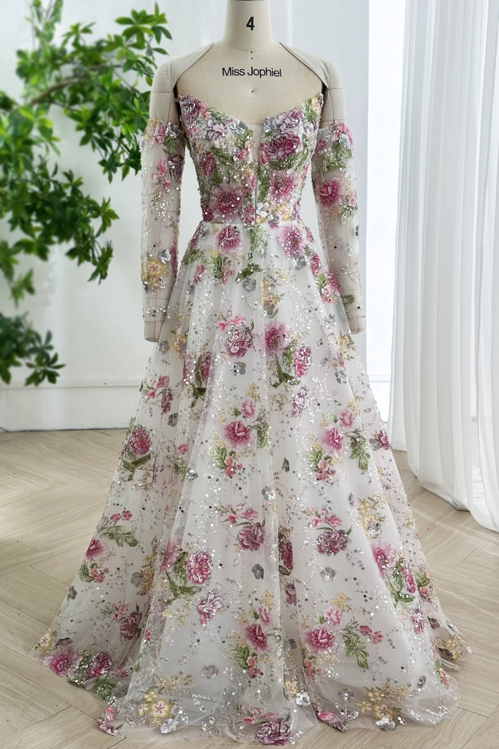 Frontfull A-line silhouette garden-bridal springtime palette off-shoulder neckline sequinsparkle chapel-sweep glamour profile