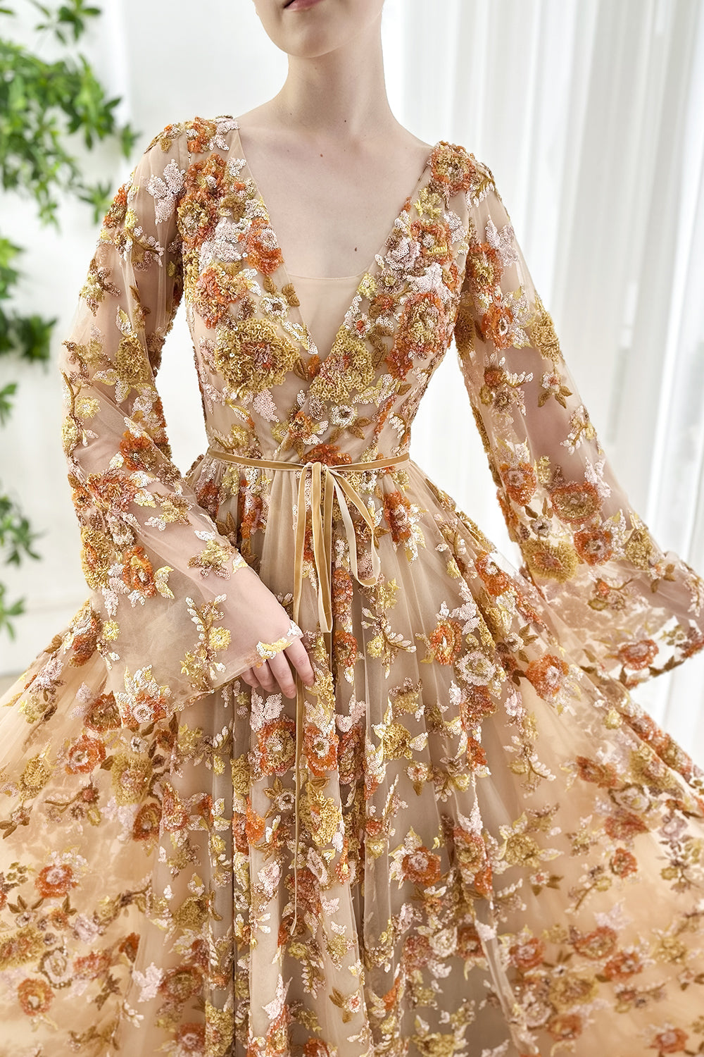 Textured-honey beading vintage-inspired aesthetic autumn-tones refined-outline deep-V-back elegant-posture