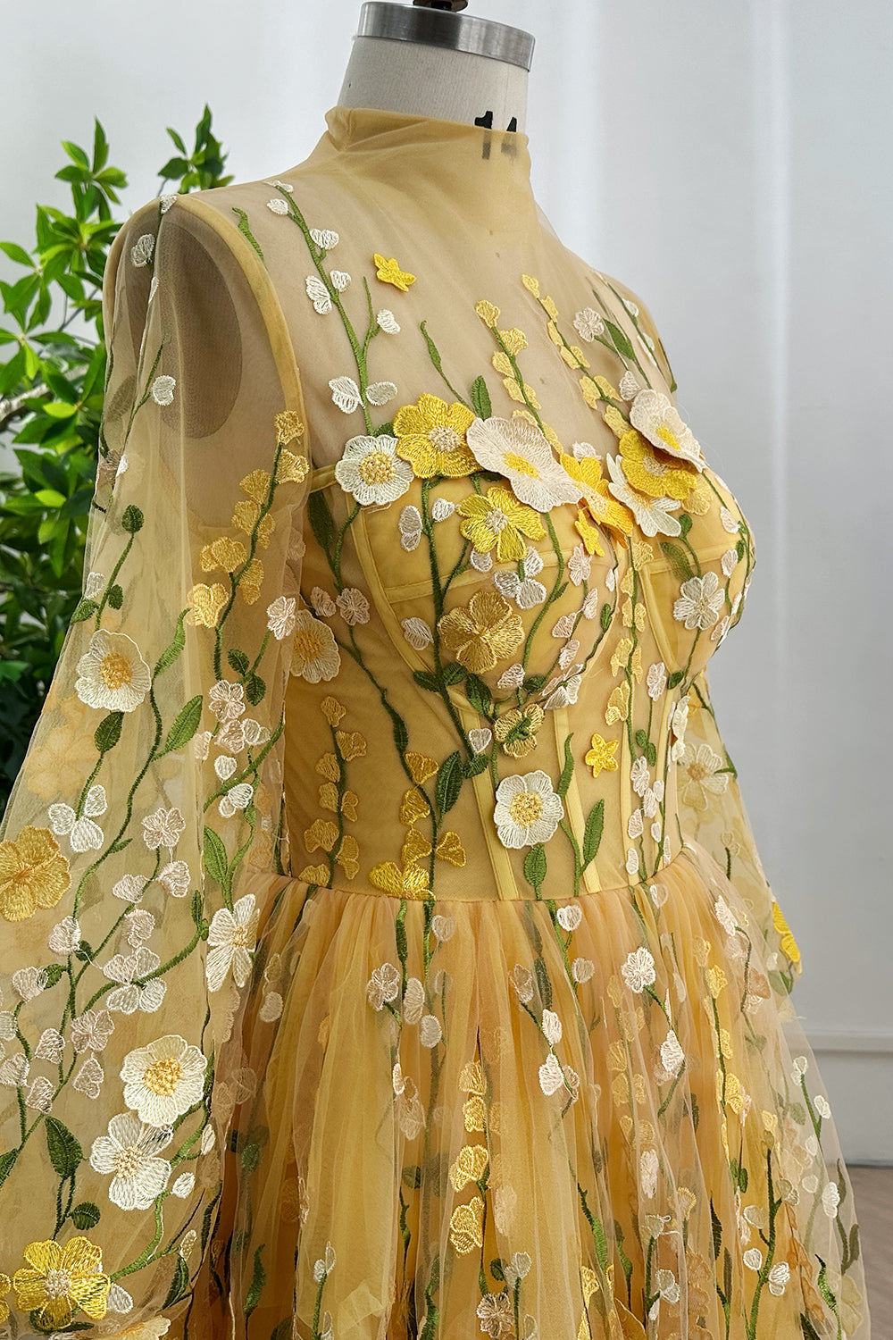 buttercuptulleillusionfloralembroiderygownsheerbackgardenwovenpetaldesignethereallinesflowingskirtpoeticromancedetailingshine