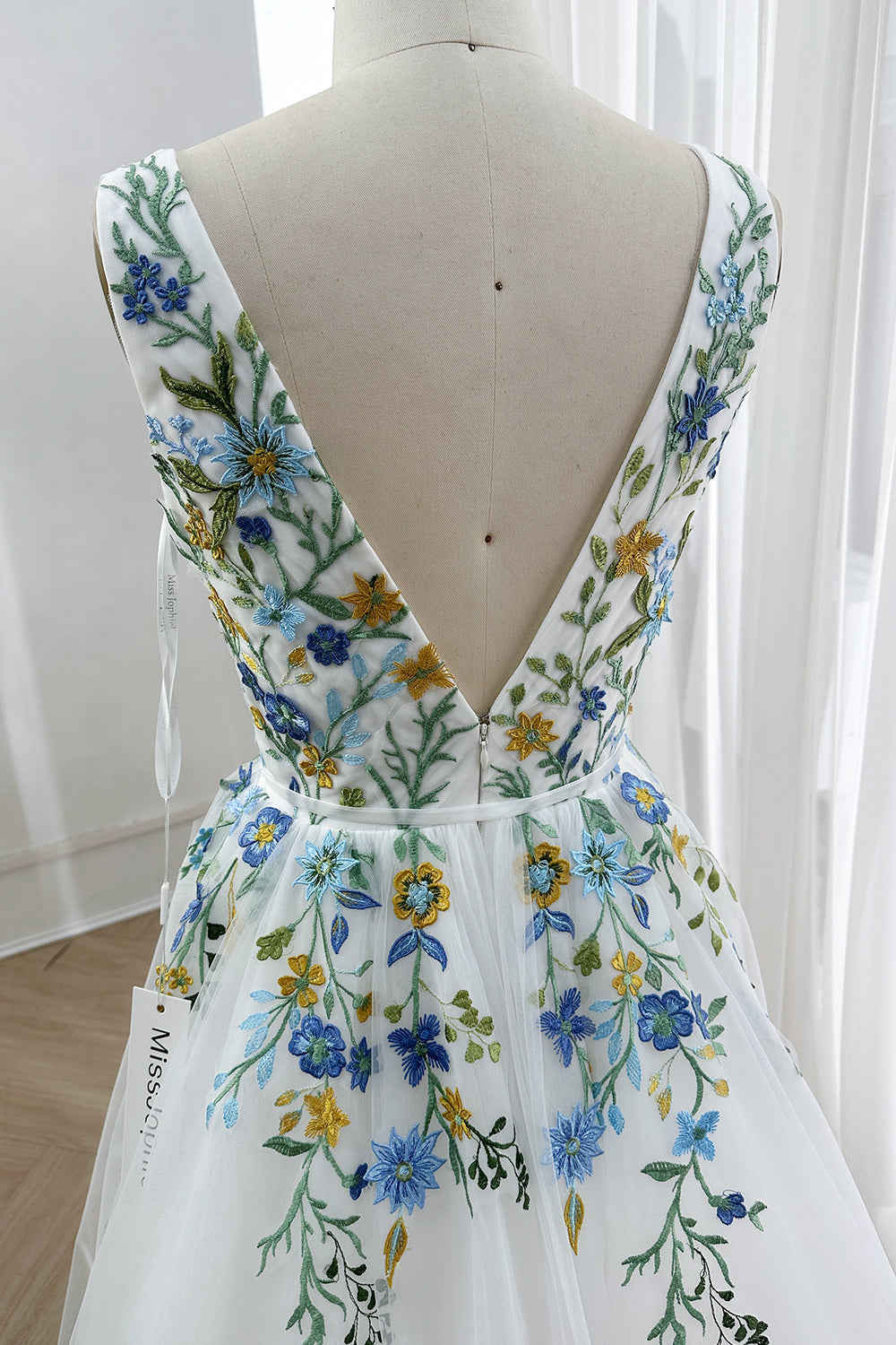 Stunning backless V-back zipper closure ribbon waist tie luxury couture feminine silhouette chic
