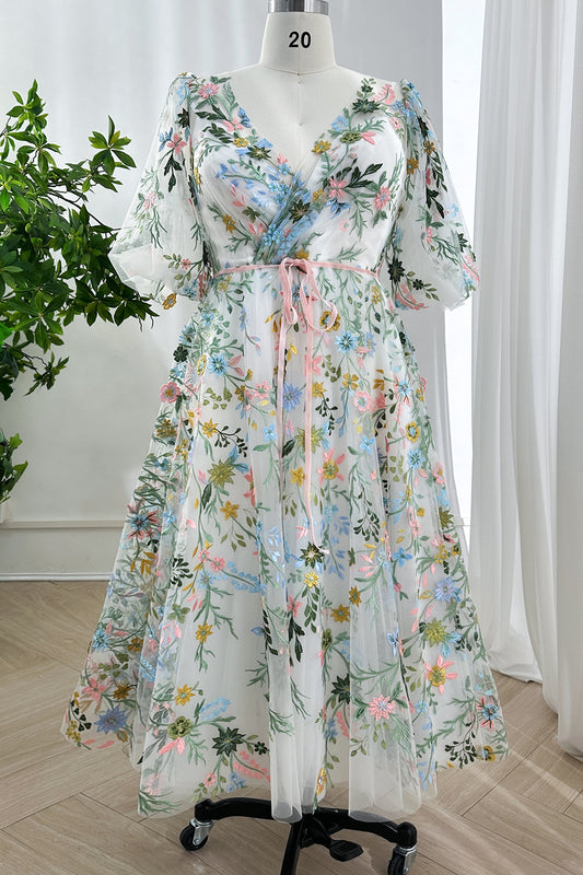 Elegant tea-length silhouette provides bohemian wedding guests or graduations having voluminous skirt movement vintage charm.