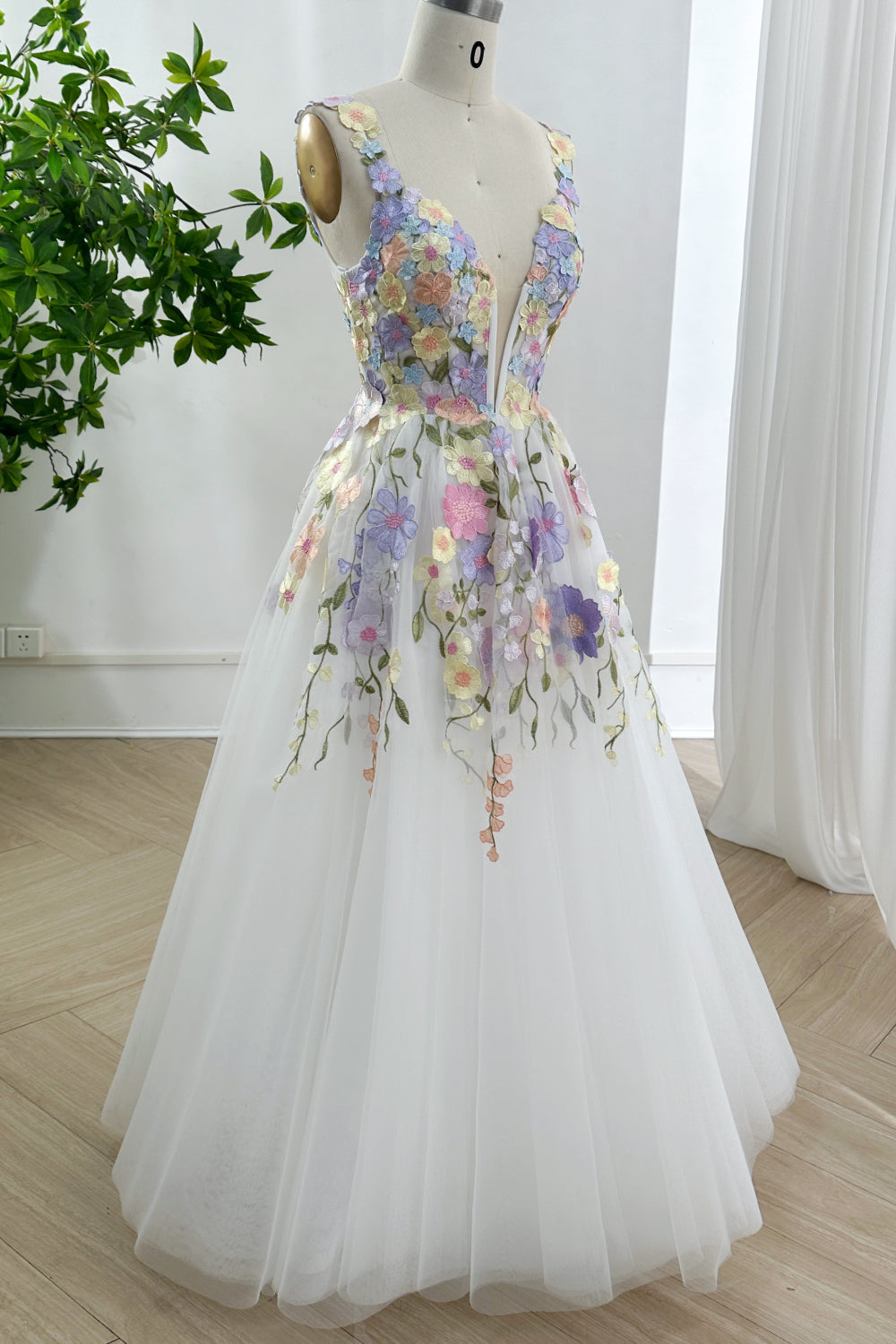 Gardeninspired artistic aline celebration attire presented full length revealing floating layers movement lightness fantasy ambience studio environment