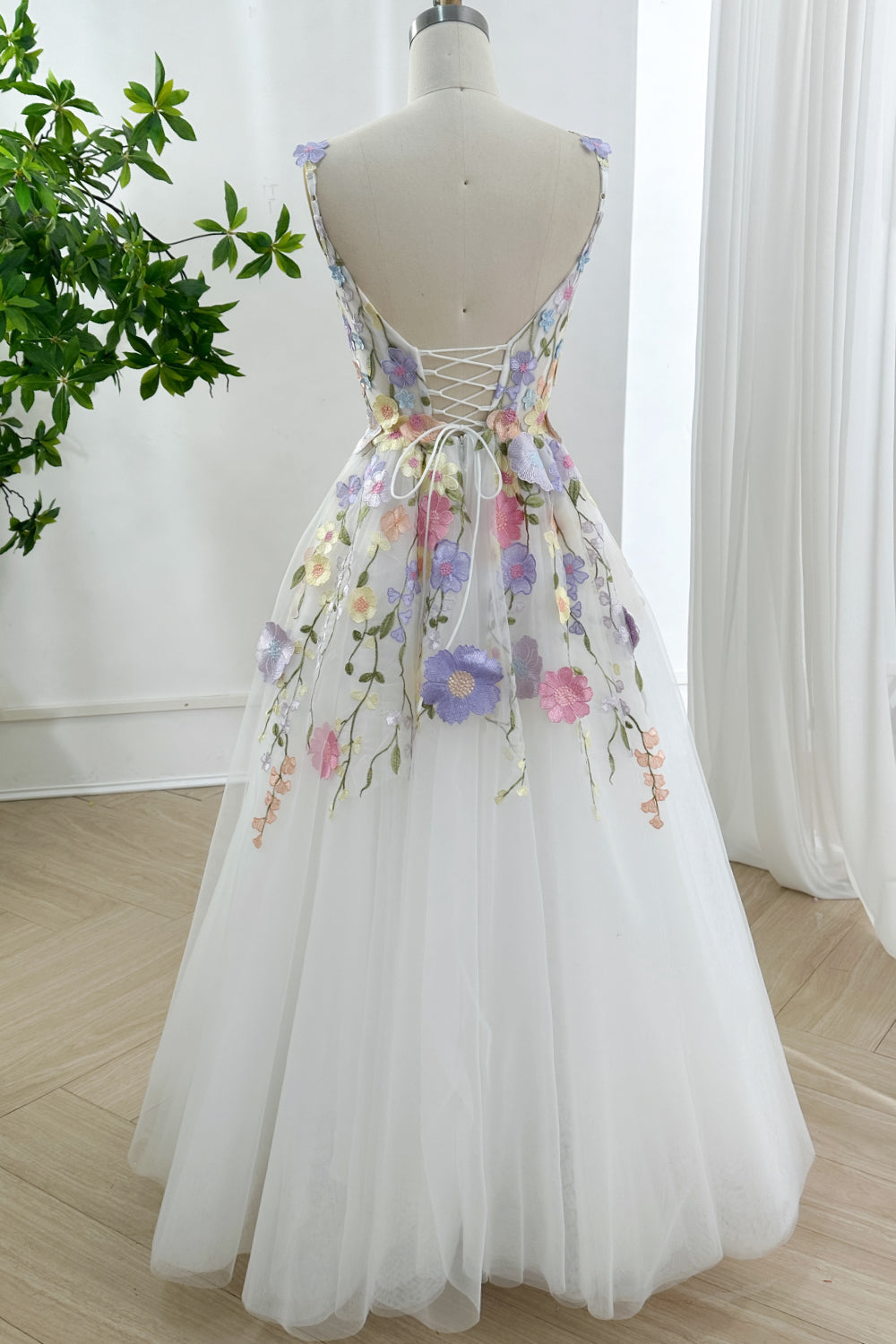 Poetic multicolor textile dreamscape ceremony look shown distant viewpoint illustrating flowing volume craftsmanship artistry refined bridal vision