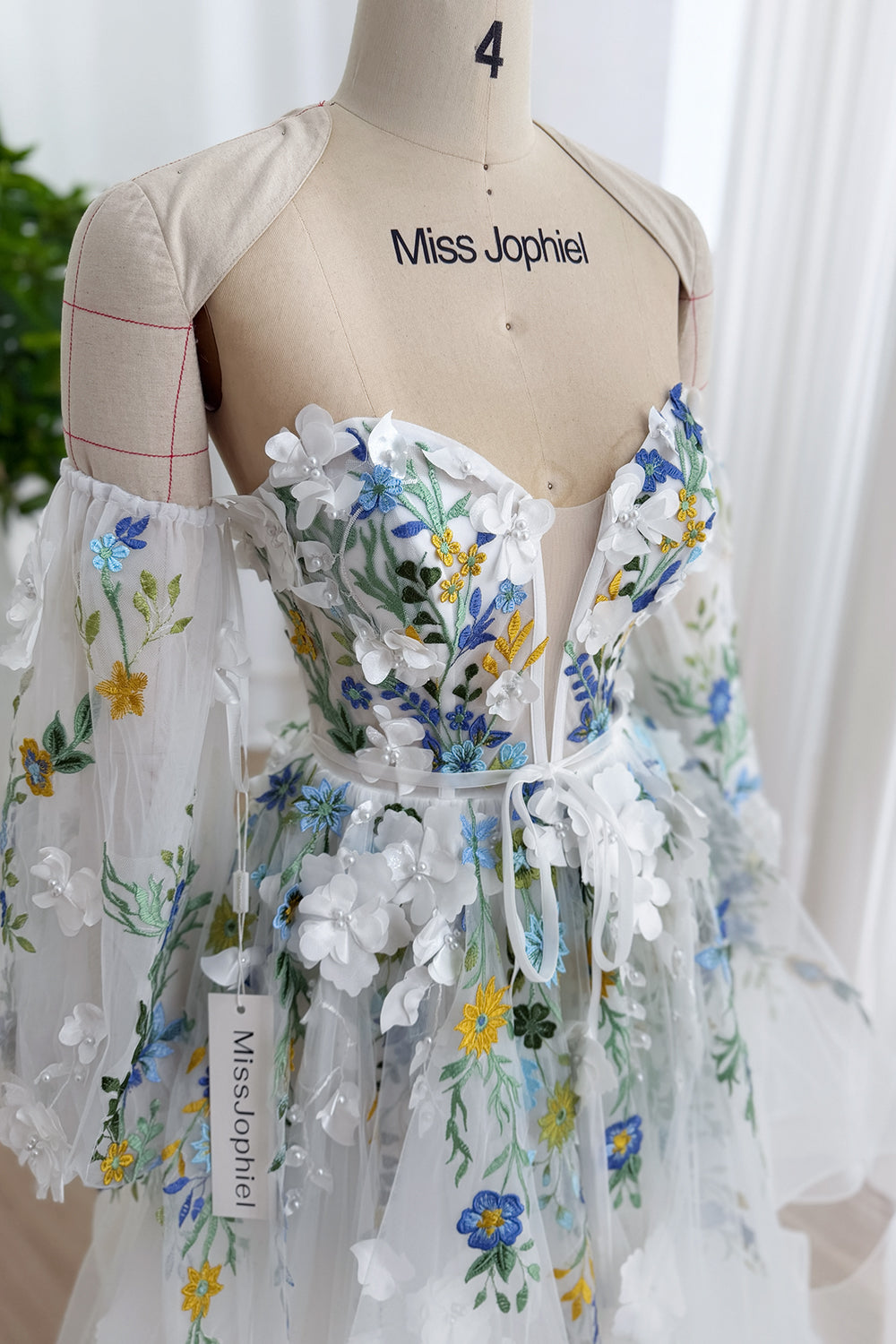Ivory Floral Embroidered Tulle Wedding Gown with Cascading Ruffle Skirt