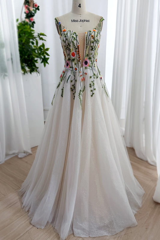 Full front ivory A-line bridalwear with plunge illusion insert, leafy appliques, glitter skirt, romantic garden mannequin fit