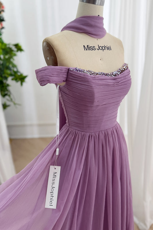 Dusty lavender chiffon gown displays ruched corset, jeweled sweetheart trim, floating scarf on bridal mannequin