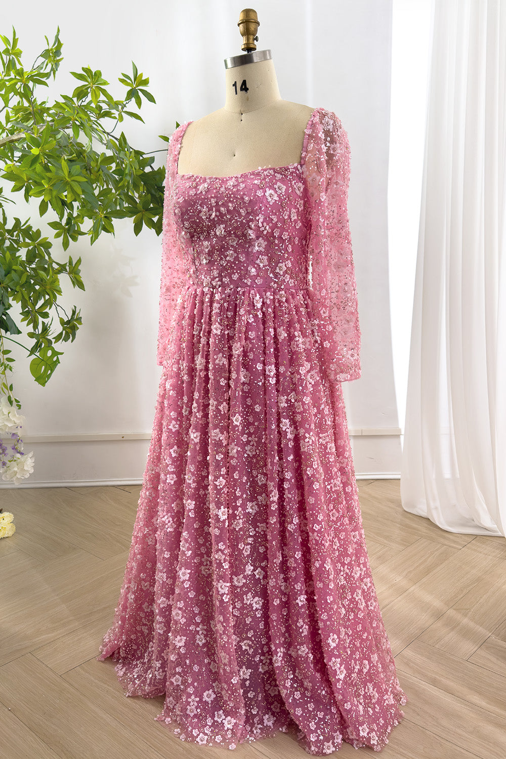 Graceful embellished floral dress angled softly revealing flowing textured skirt blooming details creating captivating silhouette charm