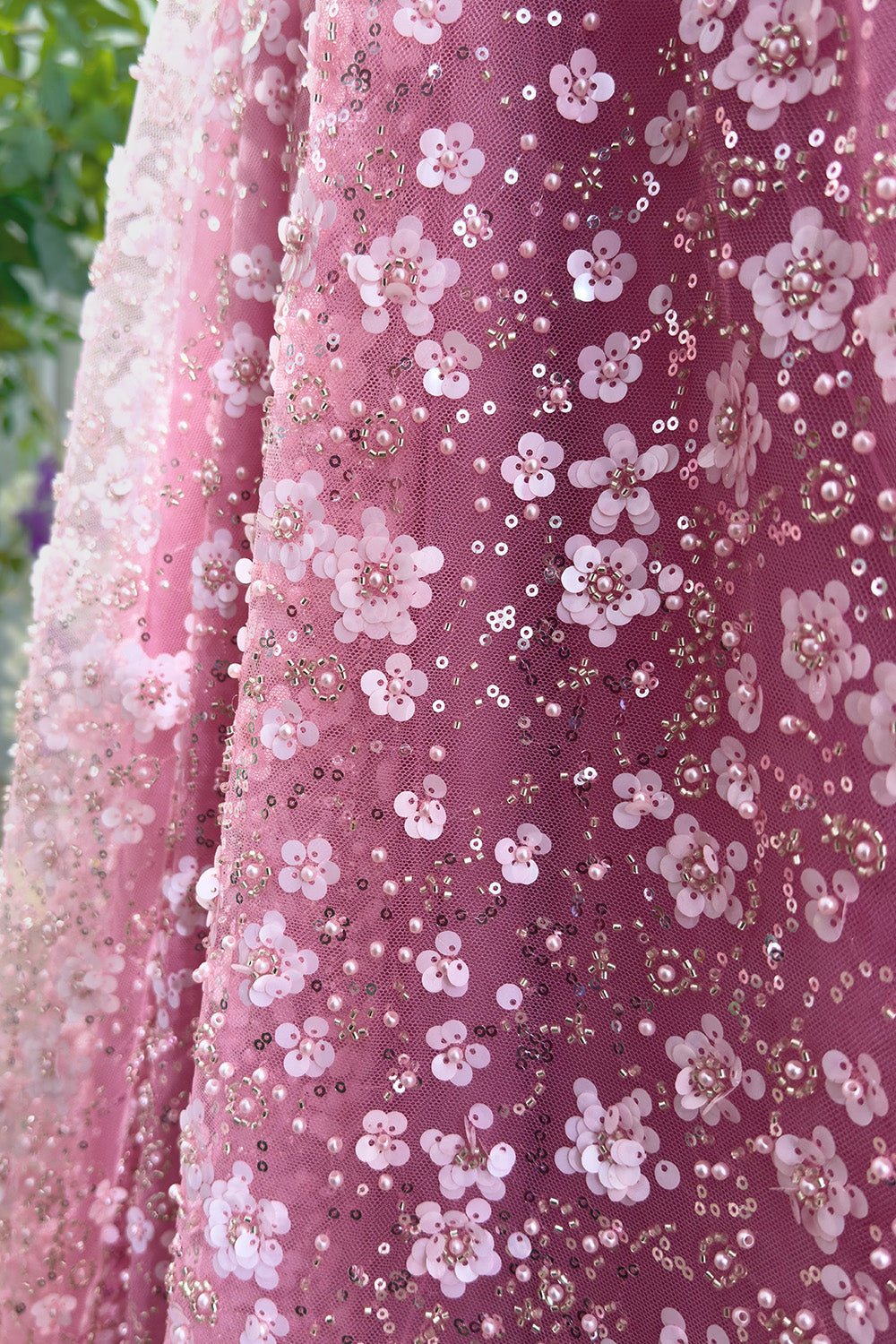 Intricate fabric macro capturing dimensional petals shining sequins tiny beads blending artistry texture creating enchanting surface