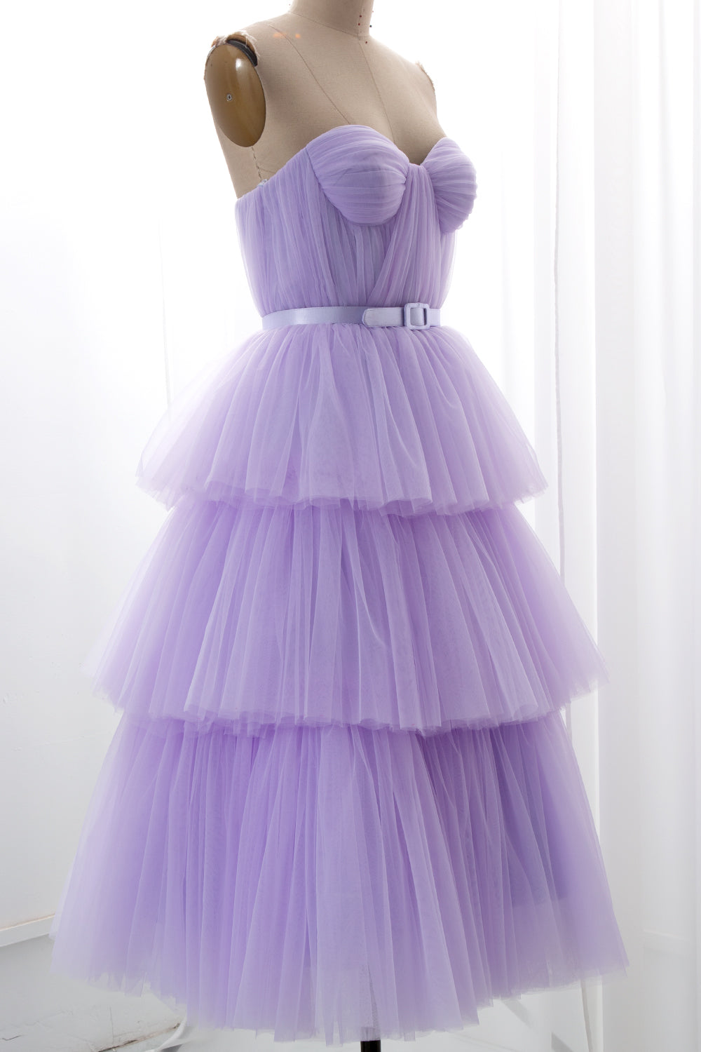 Lilac princess-style dress with sweetheart neckline and multi-tiered mesh fabric perfect for prom celebrations