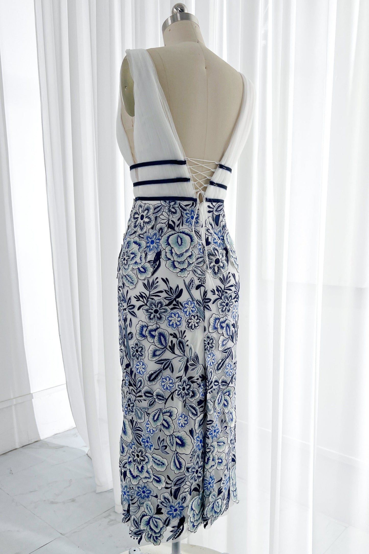 blue and white embroidered dress MissJophiel Blue and White Embroidery Floral Sheath Deep V Neck Midi Dress