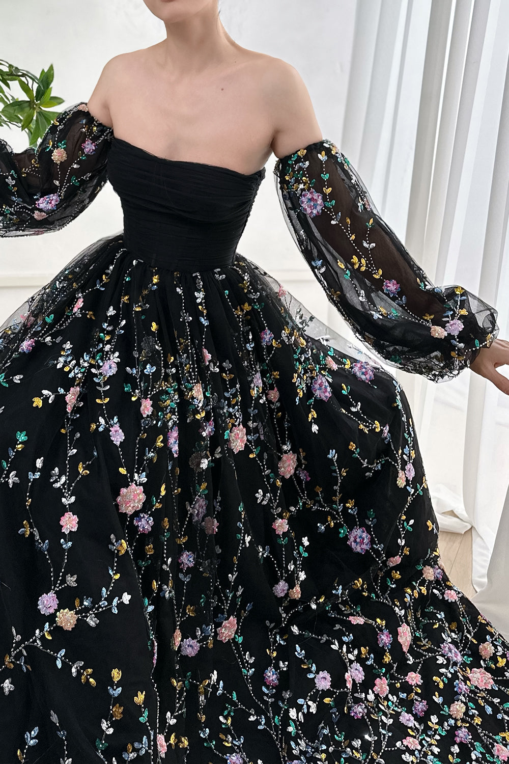 black sequin embroidered dress Black sequin and bugle bead embroidered dress with sheer sleeves